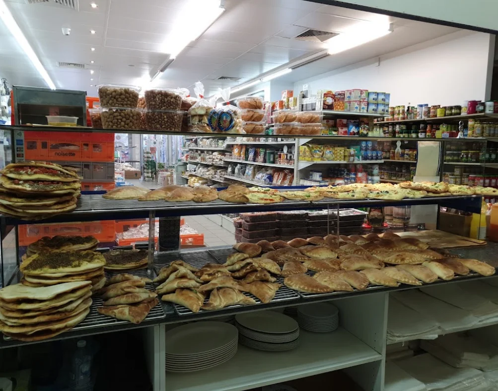 Inside Abdallah Brothers Bakery — fresh displays and counter